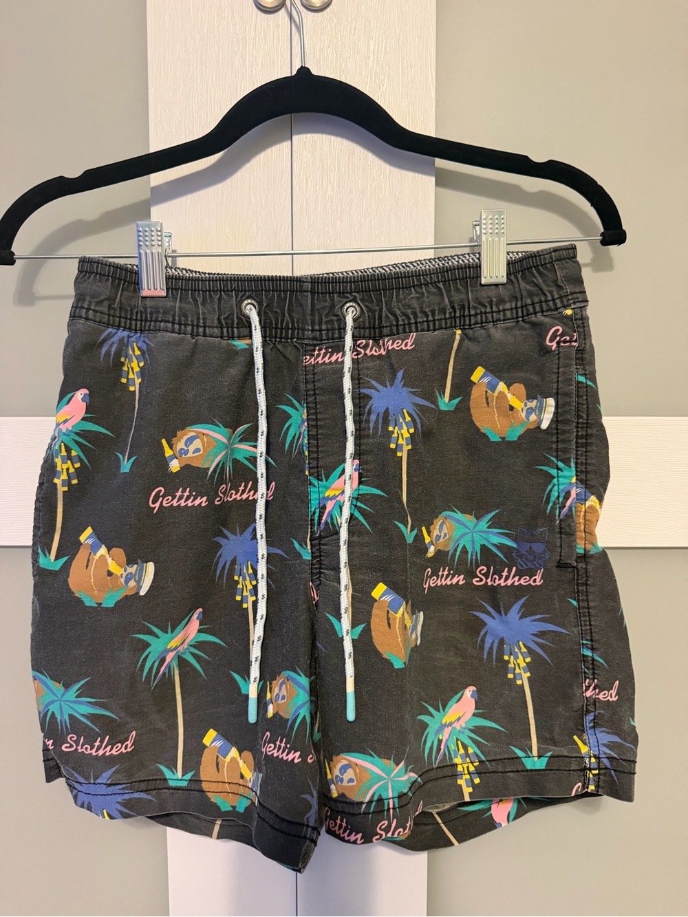 Party Pants Black Tropical Sloth Print Men's Swim Trunks